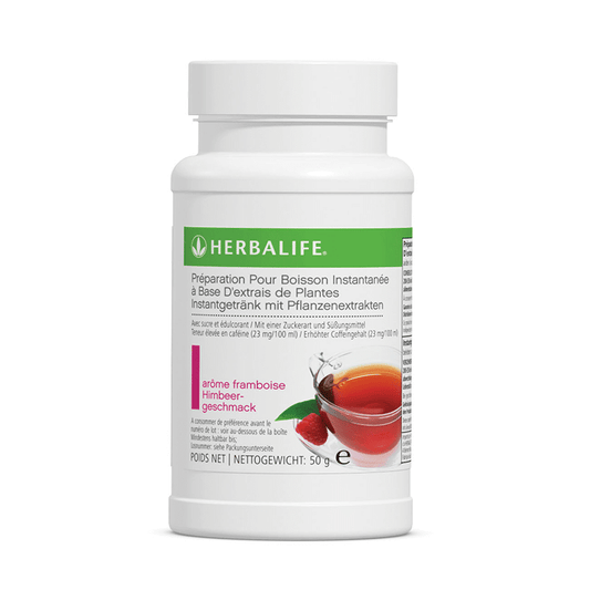 Herbalife Tea Instant Drink With Plant Extracts bottle shown with raspberry flavor and plant-based ingredients.