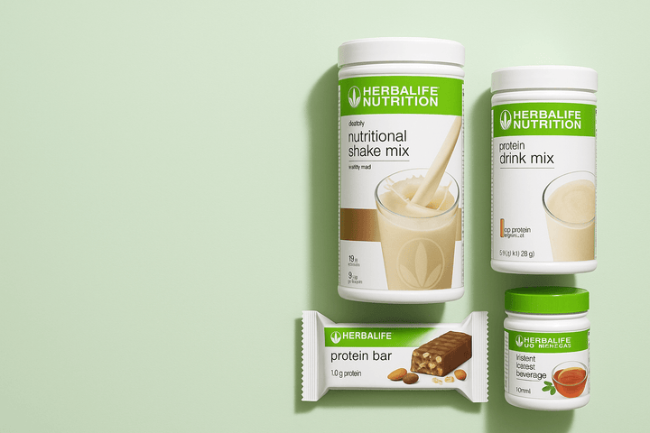 Herbalife nutritional products, including shake mix, protein drink mix, and protein bar on a pastel green background.